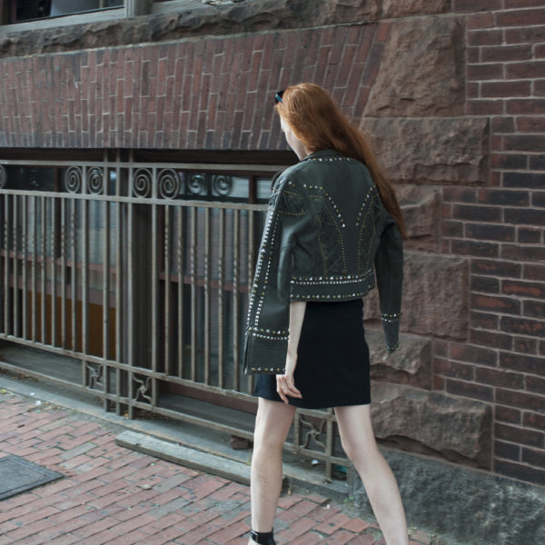 fashion blogger wearing studded leather jacket on Newbury Street Boston
