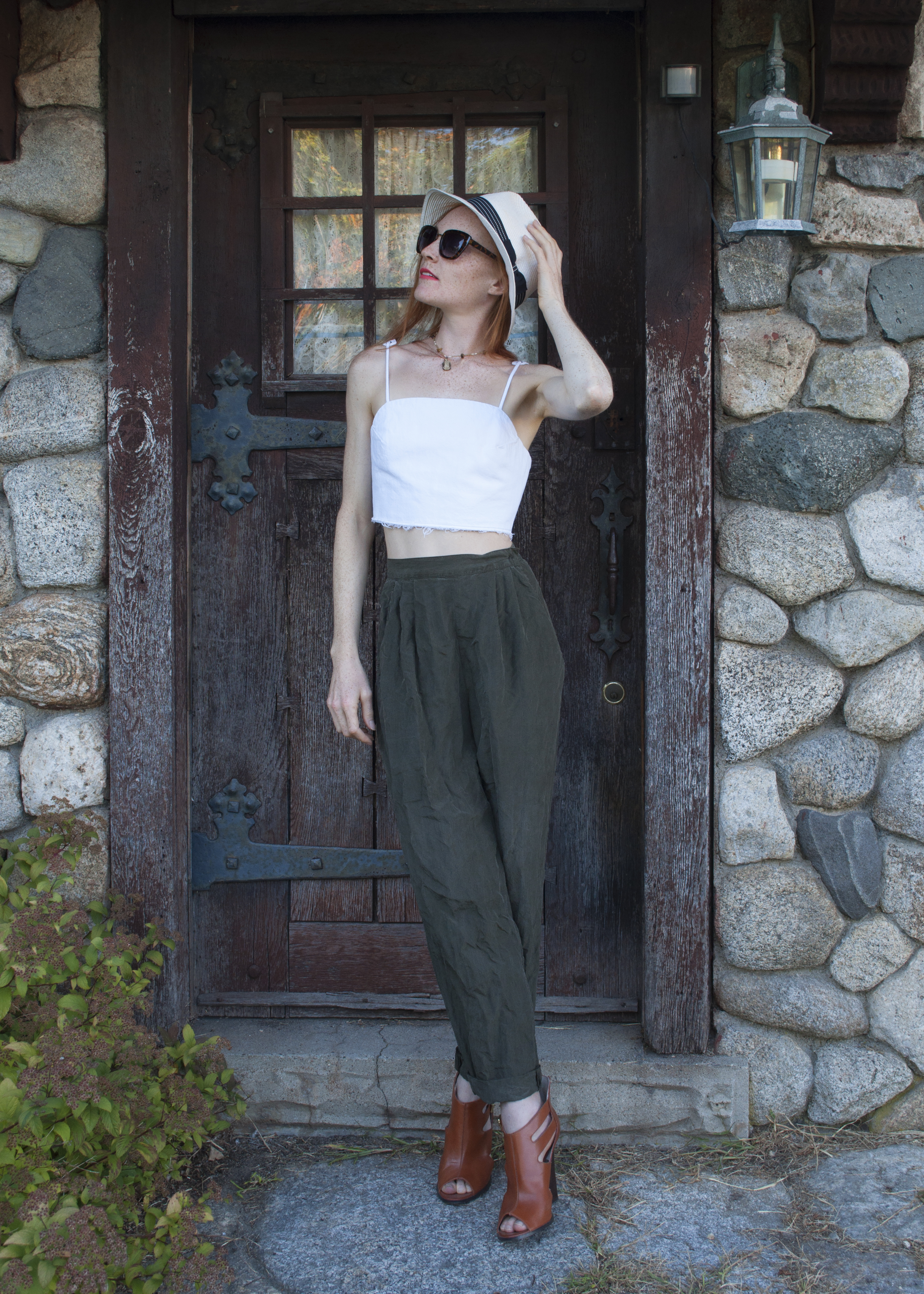 fashion blogger wearing zara crop top and high waist silk pants