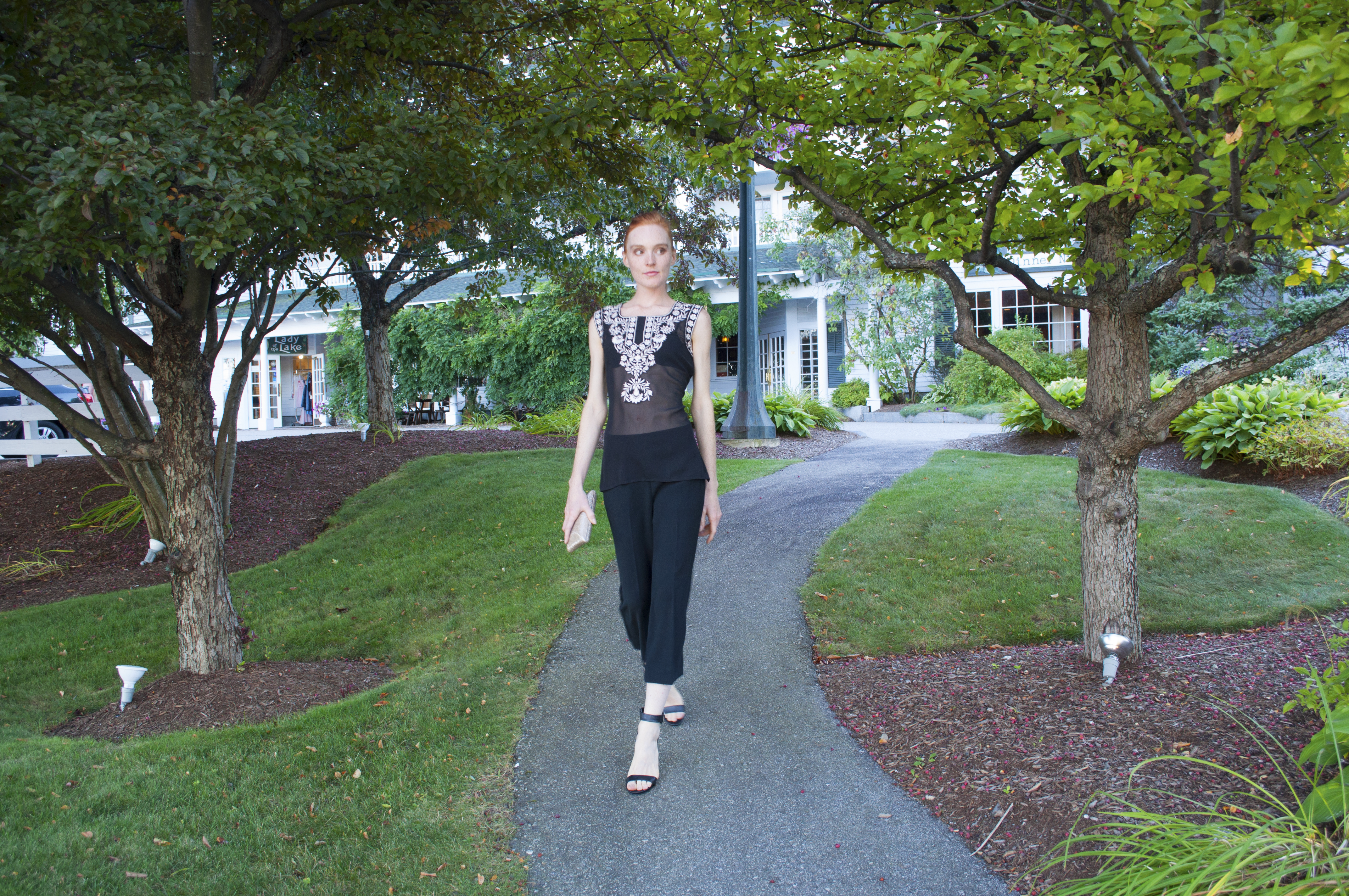 fashion blogger in handmade embroidered sheer lace top 