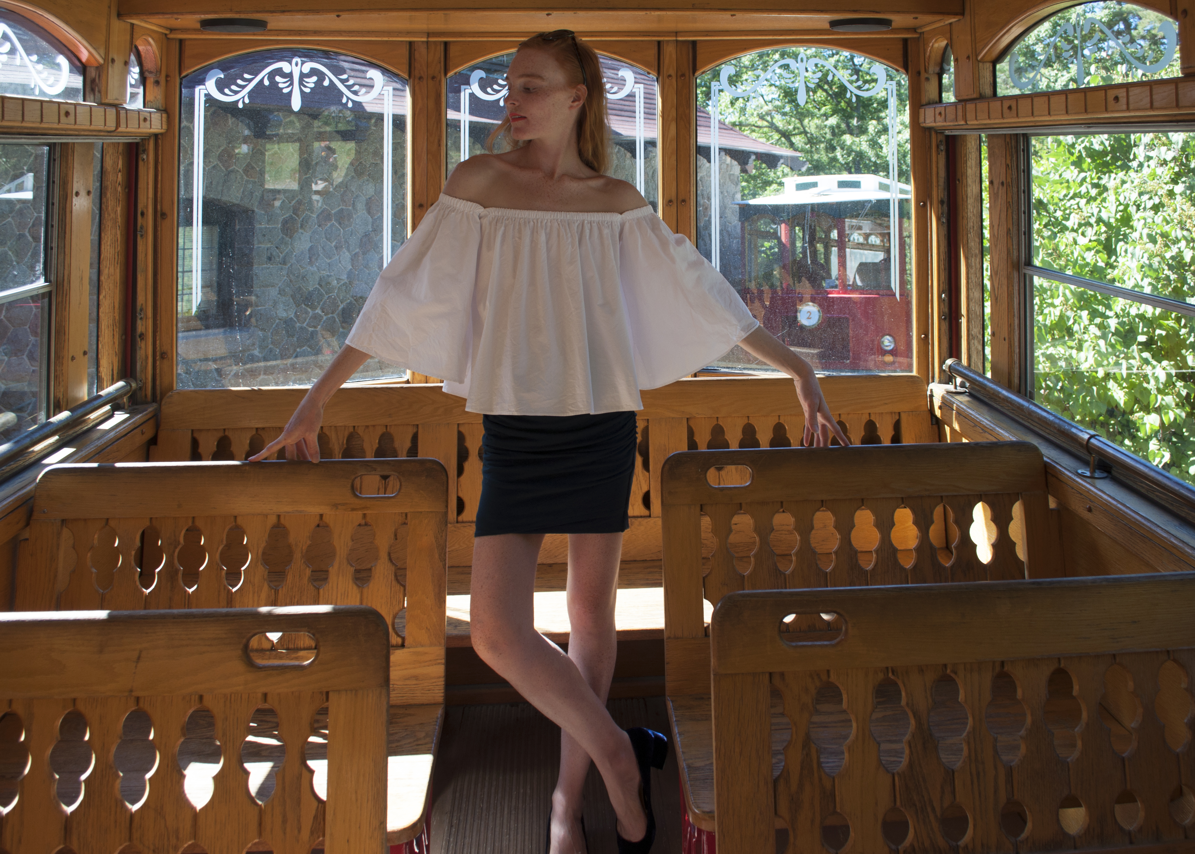 fashion blogger in castle in the clouds trolly