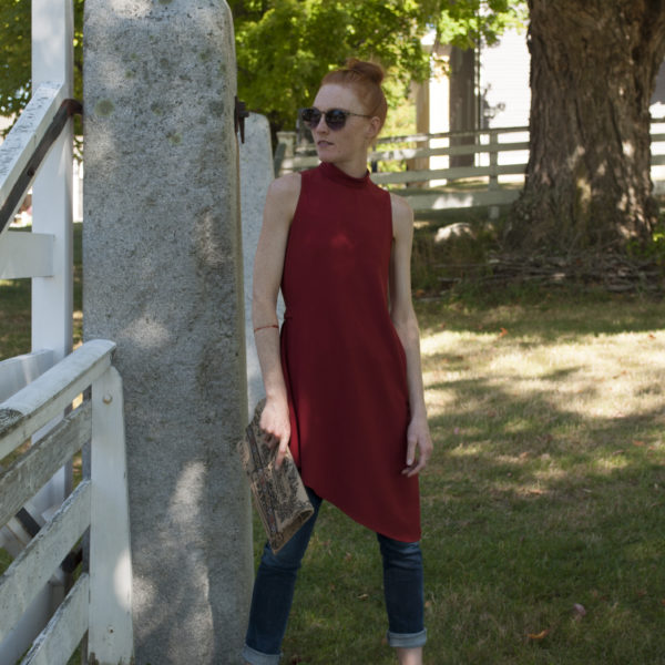 fashion blogger wearing a dress over jeans