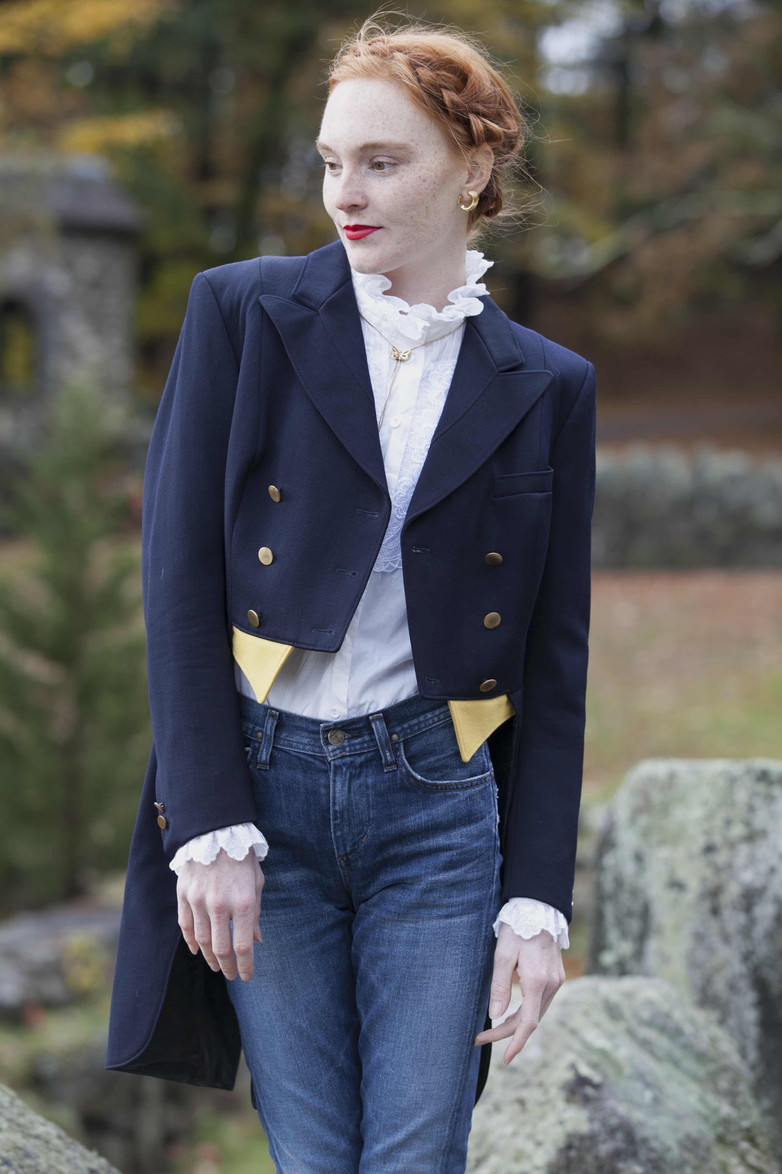 blogger wearing tailcoat and blue jeans