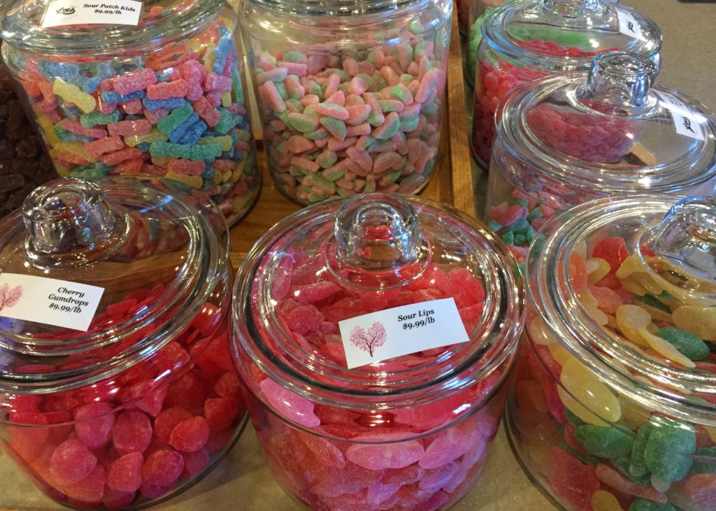 colorful candy in glass containers 