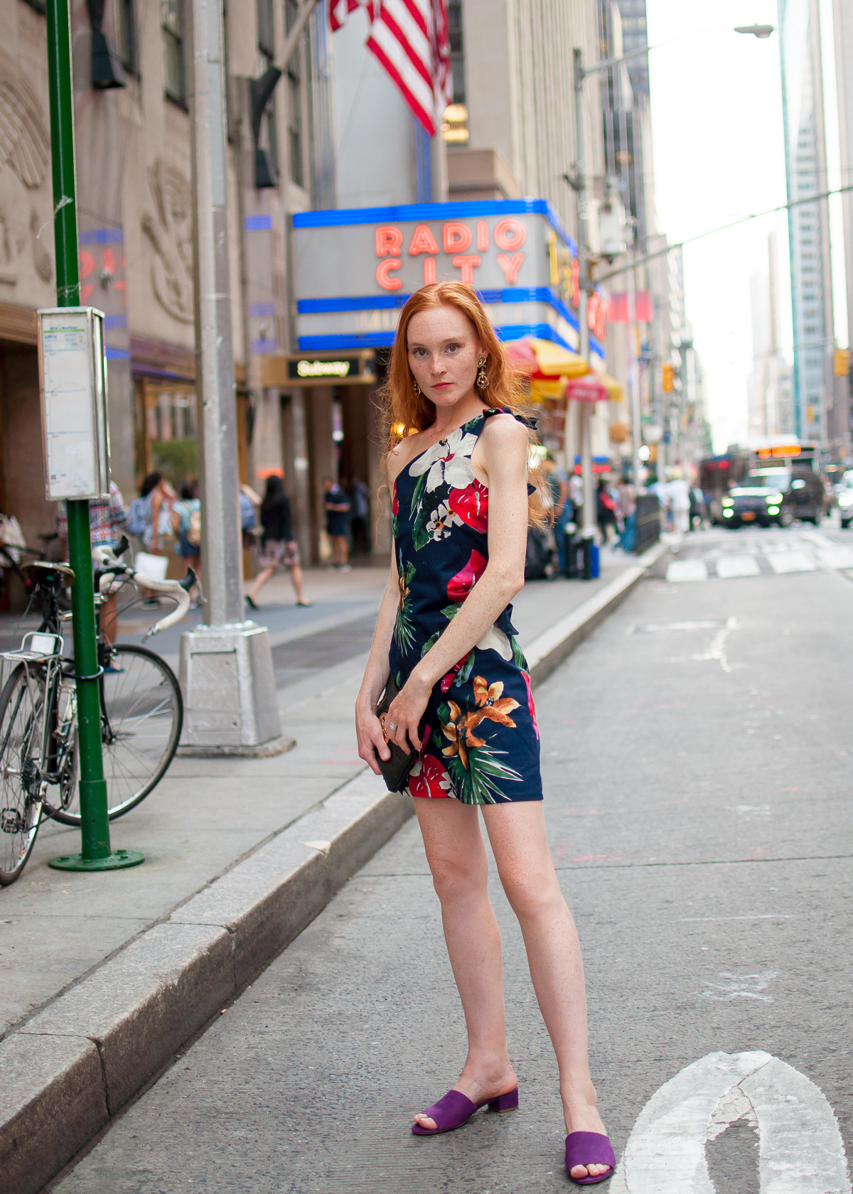 style blogger Mary O'Neill in front of Radio City Music Hall NYC