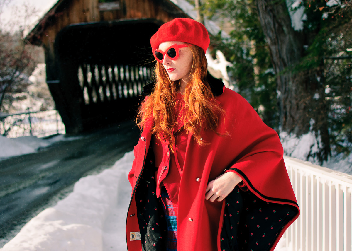red beret and vintage cat eye sunglasses with red cape