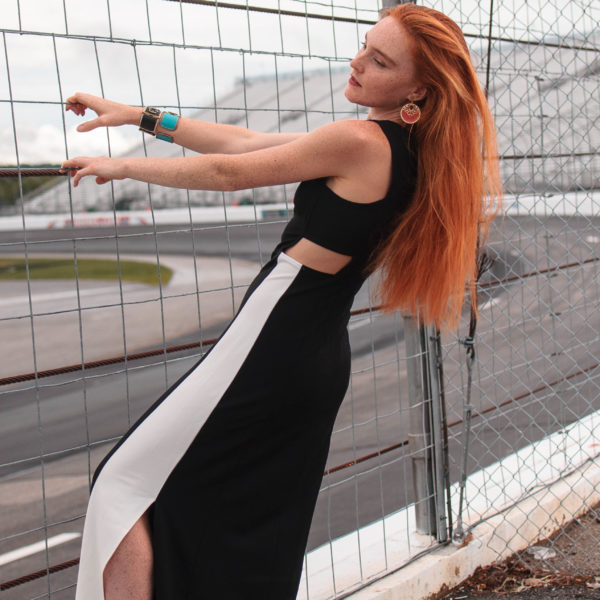 wearing black and white chicwish contrast splendor cut out maxi dress at New Hampshire motor speedway Loudon